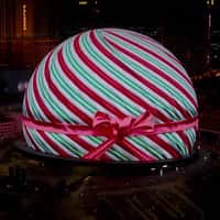 Sphere Christmas Ball Unwraps Holiday Layers