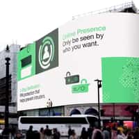 WhatsApp Vault Door Swings Out Beyond Billboard