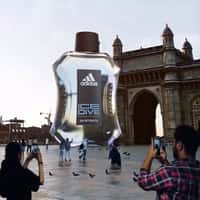 Nykaa Man Climbing Adidas Perfume Bottle