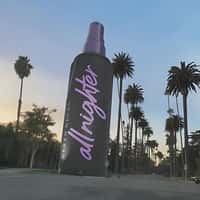 Urban Decay Spray Stands Along Palm Trees