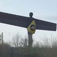 JD Sports Duffle Bag Worn by Statue