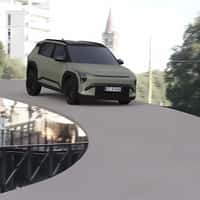Kia SUV Crossing Canal on Extending Bridge