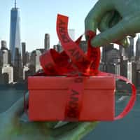 DKNY Statue of Liberty Unwraps Gift Box
