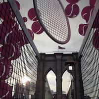 DKNY Tennis Balls and Rackets Rotates on Bridge