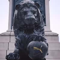 PUMA Lion Statue Holds Soccer Ball