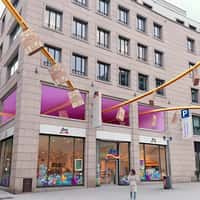 DM Shopping Bags Glide on Conveyor Tracks