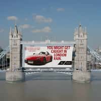 Mercedes Poster Rolls Down at Tower Bridge