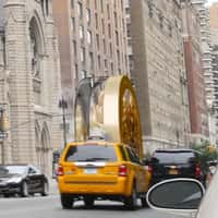 Elizabeth Arden Container Rolling on Street