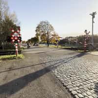 HEMA Toy Train Crossing the Railway