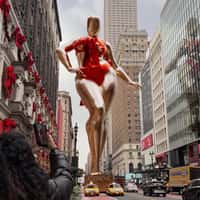 Adore Me Golden Mannequin Pulled by Taxis