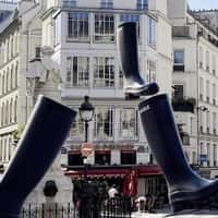 Aigle Black Boots Descending on Street