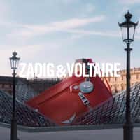 Zadig&Voltaire Red Bag Ascends at Glass Pyramid