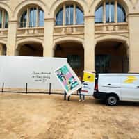 La Poste Crews Put Post Stamp on Envelope