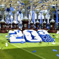 FC Porto Tropies Displayed on Stadium Field