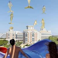 Delphin Hotels Dolphins Emerge from Building