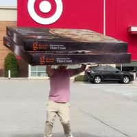 Target Man Relaxing on Oversized Chair
