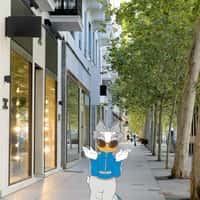 Disney Daisy Duck Poses at Urban Street