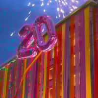 Attica Number Balloons Rise from Mall Facade