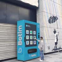 Botim Man Gets Card from Vending Machine