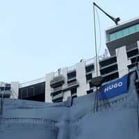 Hugo Jeans Hanging From Building