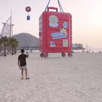 Centrepoint Suitcase on Inflatable Lands on Beach