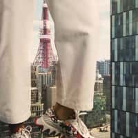 Christian Louboutin Giant in Sneakers on the Street