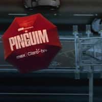 Claro Red Umbrella Hovers Above the City