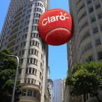 Claro Red Tennis Ball Wedged Between Buildings