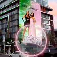Hello Molly Model Throws Crown from Billboard