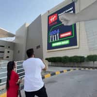 Virgin Mobile Hand Reveals QR Code on Billboard