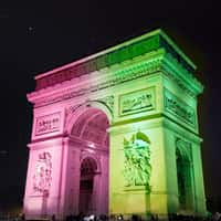 Universal Arch Lights Up in Green and Pink