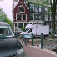 Nissan Car Runs Above Canal