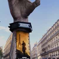 Paramount+ Zombie Arm Column Stands on Paris Street