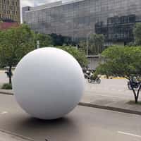 Punto Blanco Giant White Sphere Rolls Across City and Store