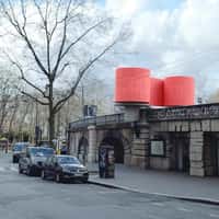 Renova Train Passes Through Giant Red Roll