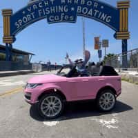 Santa Monica Pier Stitch Drives Mini Pink Car