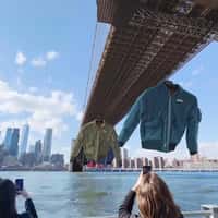 Schott NYC Bomber Jackets Glide Beneath Brooklyn Bridge
