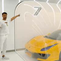 Seven Luxury Ferraris in Futuristic Showroom
