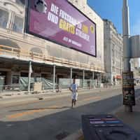 SimpliTV Footballs Burst from Billboard in Vienna