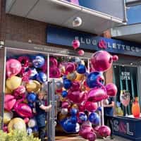 Slug & Lettuce Doors Open Releasing Balloons