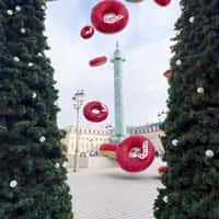 Starbucks Rain of Giant Donuts in Parisian Square