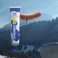 Thomy Giant Mustard Tube and Hotdog Over Swiss Alps