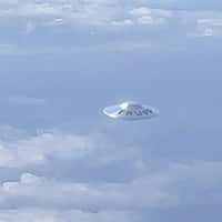 Truff UFO Spotted Above Clouds