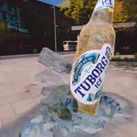 Tuborg Massive Bottle Emerges Through Ice