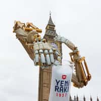 Yeni Raki Giant Robotic Arms Grip Glass Around Big Ben