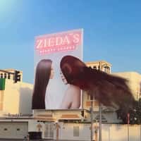 Zieda’s Clinic Flowing Hair Extending From Billboard