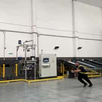 Nude Project Man Pulls Truck Carrying Giant Handbag