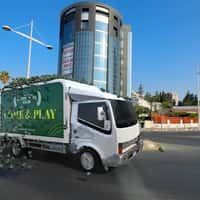 Green Padel Club Truck Loaded with Tennis Balls