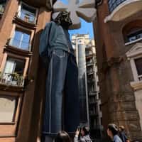 House of Pezzo Figure in Denim on Building