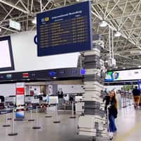 Bagaggio Towering Stack of Luggage at Airport